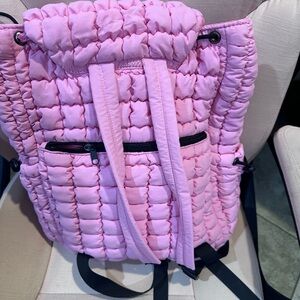 Pink puffy backpack